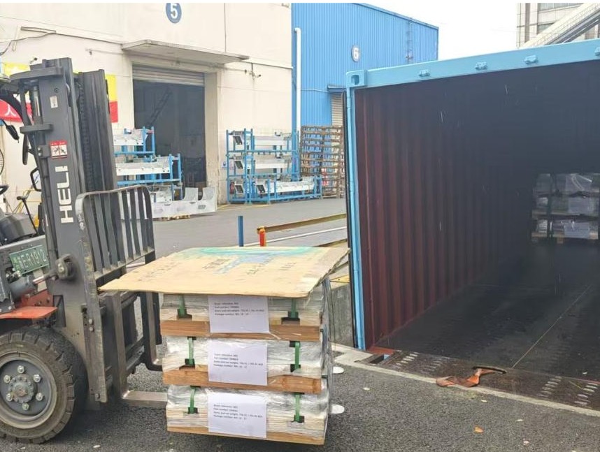Steel plate parts packed for delivery to Japan
