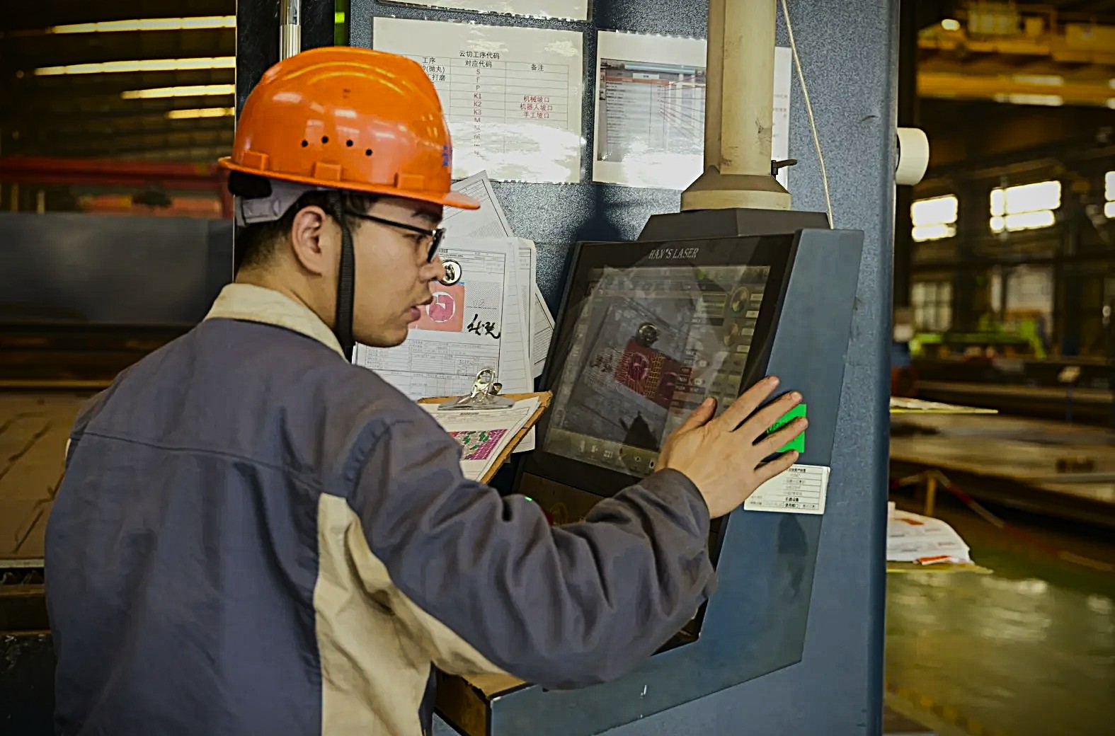 YUNCUT operator at CNC control panel — direct factory team contact